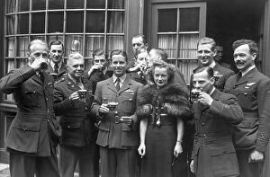 Bombing Collection: Members of 617 squadron toast Wing Commander Guy Gibson
