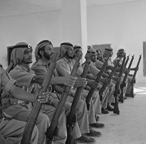 00086 Prints: Members of the Abu Dhabi defence force pose for the camera in the grounds of the Royal