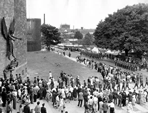 Members of the armed forces entering Coventry cathedral from Priory Street to take part