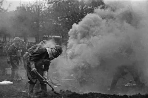 Members of the ARP demonstrate how to deal with a suspected gas attack during a series of