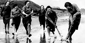 Hockey Prints: Members of an ATS company stationed somewhere on the Yorkshire Coast pictured during a
