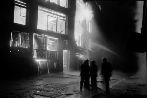 01496 Prints: Members of the Auxiliary Fire Service and London Fire Brigade seen here fighting a fire
