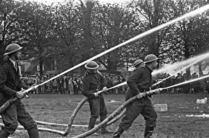 01248 Prints: Members of the Auxiliary Fire Service seen here during a demonstration of civil defence