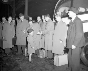 Hunter Prints: Members of the Bolton Wanderers F. A. Cup team seen here signing a young fans autograph