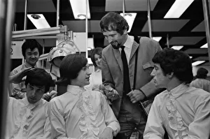 Members of the British pop group The Kinks having their hair styled at a salon