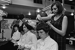 Members of the British pop group The Kinks having their hair styled at a salon