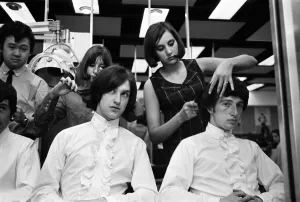 Hairdressers Prints: Members of the British pop group The Kinks having their hair styled at a salon
