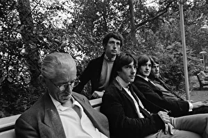Members of the British pop group The Kinks posing in a London park