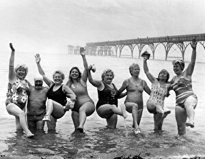01406 Collection: Members of Clevedon outdoor swimmers brave the cold, murky waters of the Bristol Channel