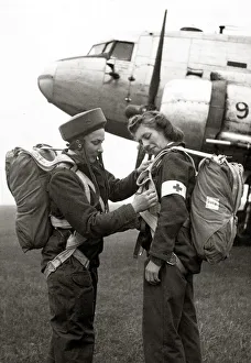 00091 Prints: Two members of the Flying Sisters, a new airborne British nursing unit prepare their