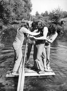 00329 Prints: Members of Heavy Metal group Black Sabbath messing about on the river in the scenic Wye