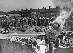 Members of the Home Guard in Liverpool, watching a demonstration by the army in Anti Tank