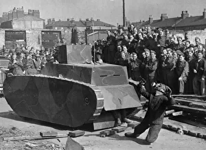 01450 Prints: Members of the Home Guard in Liverpool, watching a demonstration by the army in Anti Tank