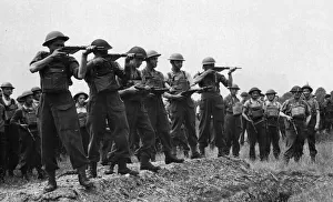 01467 Prints: Members of the Home Guard practice with Sten Guns during training exercises in Reading