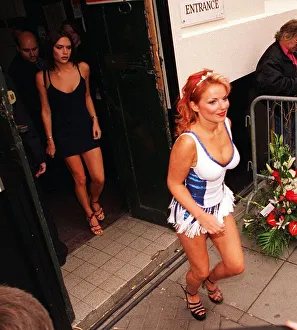 Members of Pop Group Spice Girls Victoria Adams and Geri Halliwell leaving the theatre