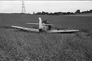 00109 Prints: Members of the RAF technical team examine a downed Messerschmitt BF109 during the Battle