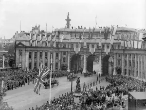 Members of the Royal Family pass under Admiralty Arch London during the Victory Day
