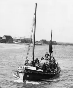 Crew Prints: Members of the Southwold, Suffolk lifeboat crew leaving harbour in their boat the Mary