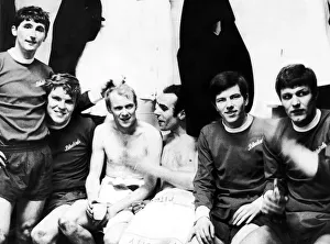Members of the victorious Cardiff City team pictured in the dressing room after their 1-0