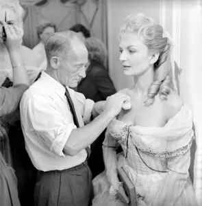 00790 Prints: Members of the Wardrobe and make-up departments at Pinewood Studios help the actresses