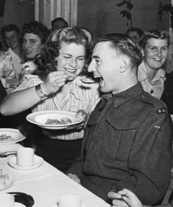 Meal Prints: Members of the West Mersey W. L. A and their boy friends attend a Harvest Home supper in a