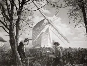 Landscapes And Gardens Prints: Men chopping wood near a windmill Windmills Windmill country Scene countryside