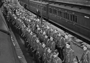 01434 Prints: Men of the East Yorkshire Regiment pictured at a railway station in Gloucestershire