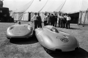 Automobile Prints: Men, including Syd Enever and Tommy Wisdom looking at the Austin Healey Sprite EX219