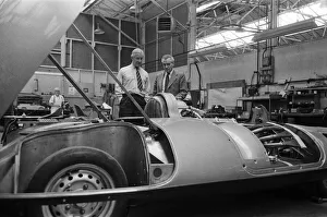 01303 Prints: Men, including Syd Enever and Tommy Wisdom looking at the MG EX181 which is being worked