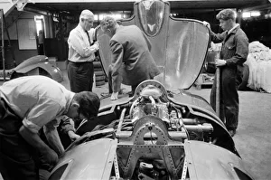 01303 Prints: Men, including Syd Enever and Tommy Wisdom looking at the MG EX181 which is being worked