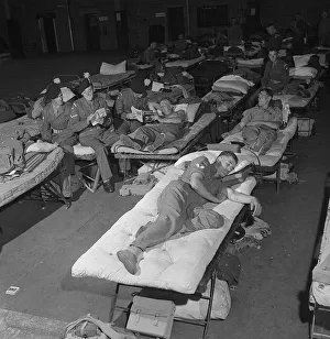 Men of the Lancashire Fusiliers set up home in a hanger in Nairobi in Kenya during