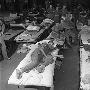 Kenya Prints: Men of the Lancashire Fusiliers set up home in a hanger in Nairobi in Kenya during