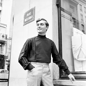 Men modelling the latest 1963 menswear designs in the streets of Paris. April 1963
