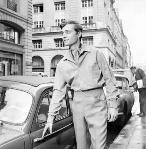 Men modelling the latest 1963 menswear designs in the streets of Paris. April 1963