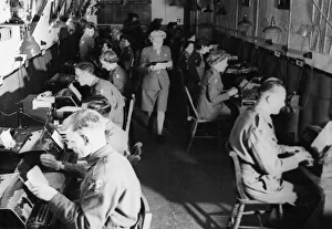 Men of the Royal Corps of Signals at work at a large formation headquarters