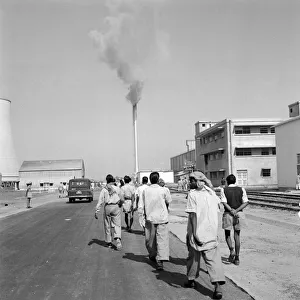 Heavy Industry Prints: Men seen here at the start of their shift at the Durgapur steel works in West Bengal