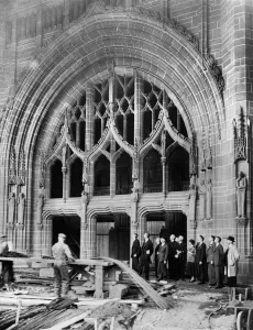 Men and women looking at the work being carried out on the construction of the Liverpool