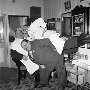 Mens Barbers Shop: Mr. Thomas the barber seen here having a joke with some of his
