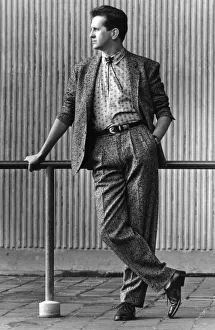 Mens Fashions Autunm 1985. Our model wears a fleck suit Miami Beach Style, Boot Lace Tie