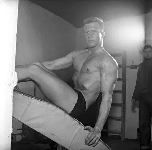 Mens Health: Body builder Larry Stevens seen here exercising in the gym. 1957