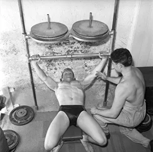Mens Health: Body builder Larry Stevens seen here with his training coach exercising