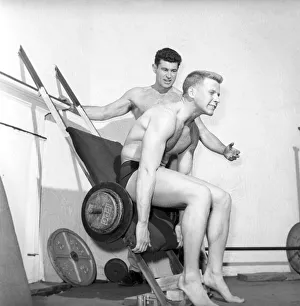 Mens Health: Body builder Larry Stevens seen here with his training coach exercising