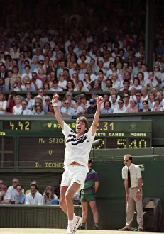 00016 Prints: Mens Wimbledon Final. Michael Stich v Boris Becker Stich celebrates