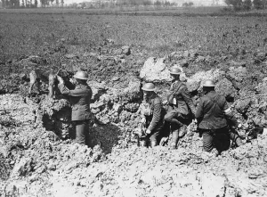Trenches Prints: A messenger dog carrying orders arrives at a trench occupied by British soldiers World