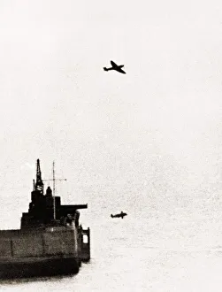 A Messerschmitt 109 and a MK II Spitfire dogfight over the outer harbour of Dover