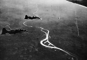 Usaaf Prints: A Messerschmitt 110 goes down in flaming pieces before the massed fire power of