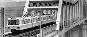 City Prints: A Metro train crosses the Tynes newest bridge for the first time