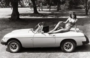 MGB Convertable Sport 1975 - Motors - Motor Cars Car sexy model posing on top
