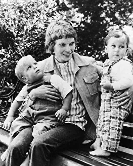 And Child Prints: Mia Farrow Actress with her two sons Sascha Villiers and Matthew Phineas sitting on park