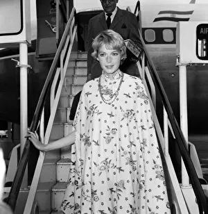 Mia Farrow arrives at Heathrow Airport from Delhi after visiting the Maharishi meditation